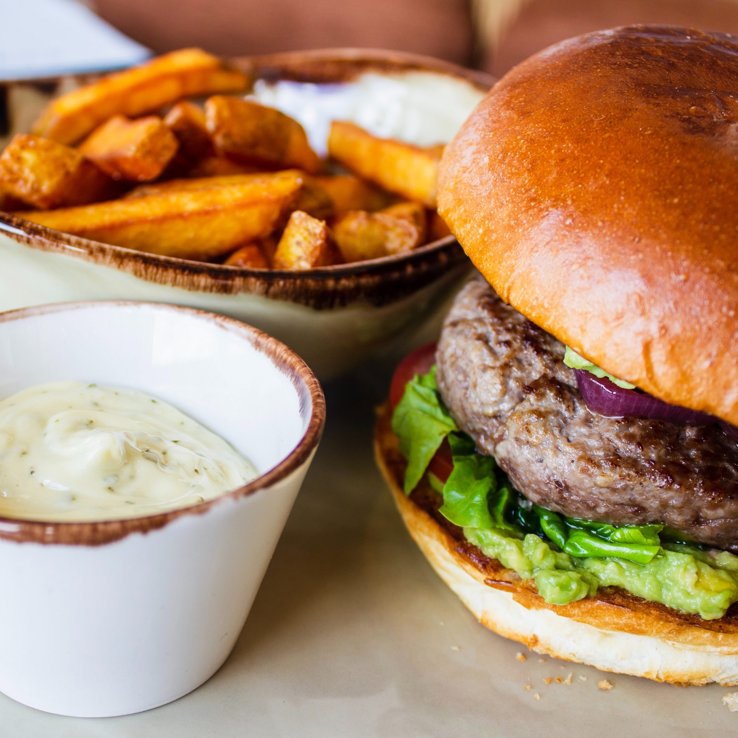 burger and chips with garlic mayo