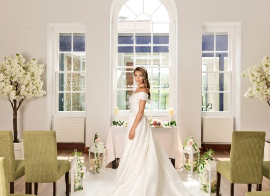 6S2A1988 Patrick bride standing in centre of aisle looking back towards camera