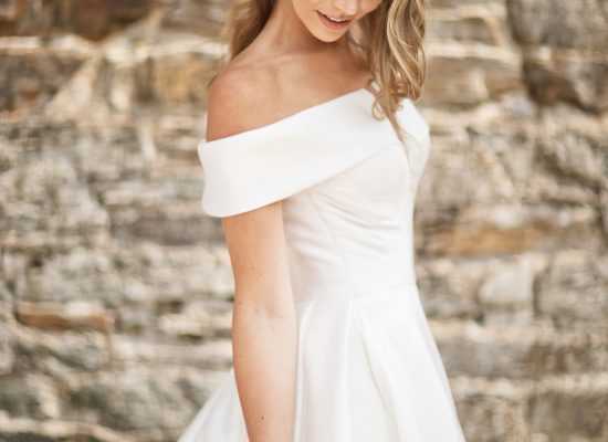 6S2A2657 Patrick bride looking down with one arm in view elongated