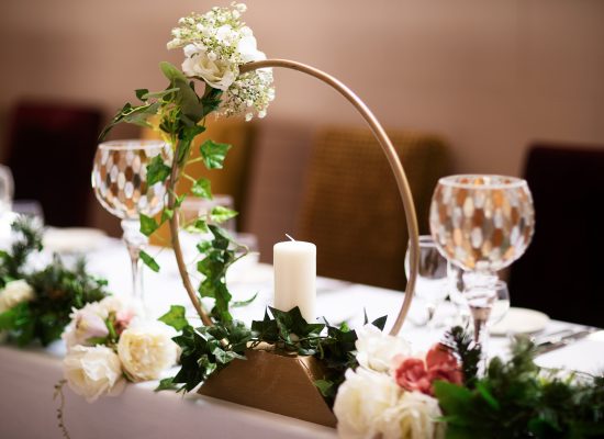 6S2A2910 Patrick shot of candle in circular arch on table