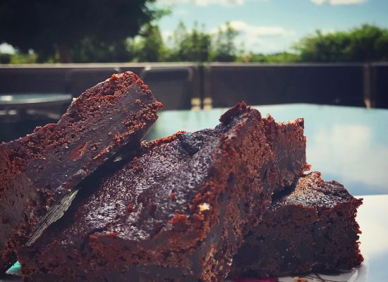 8A458AF7-8E4C-4818-A0A9-0CF32E8F1368 up close shot of brownies on a plate