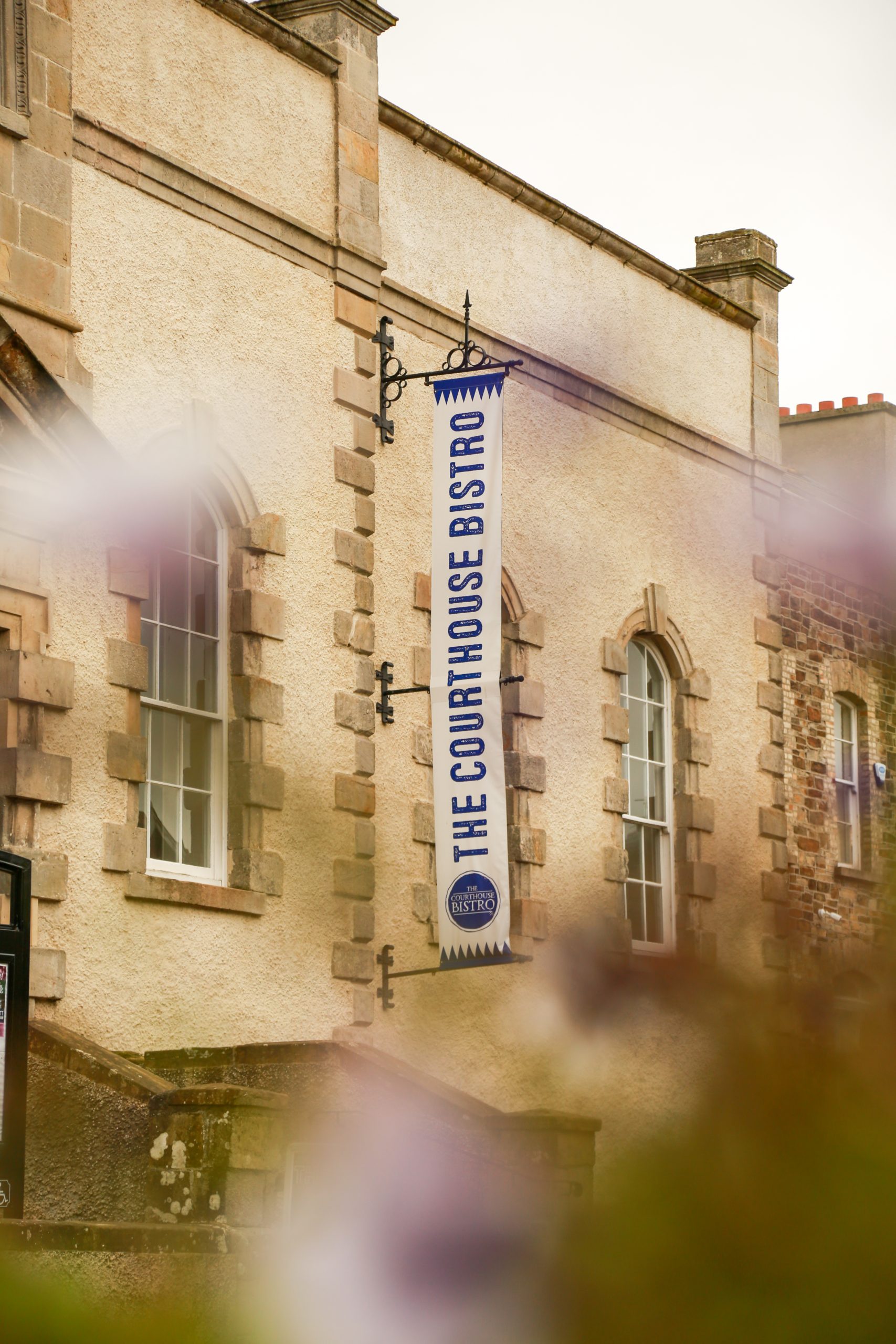 exterior of Lifford Old Courthouse up close facing Bistro sign