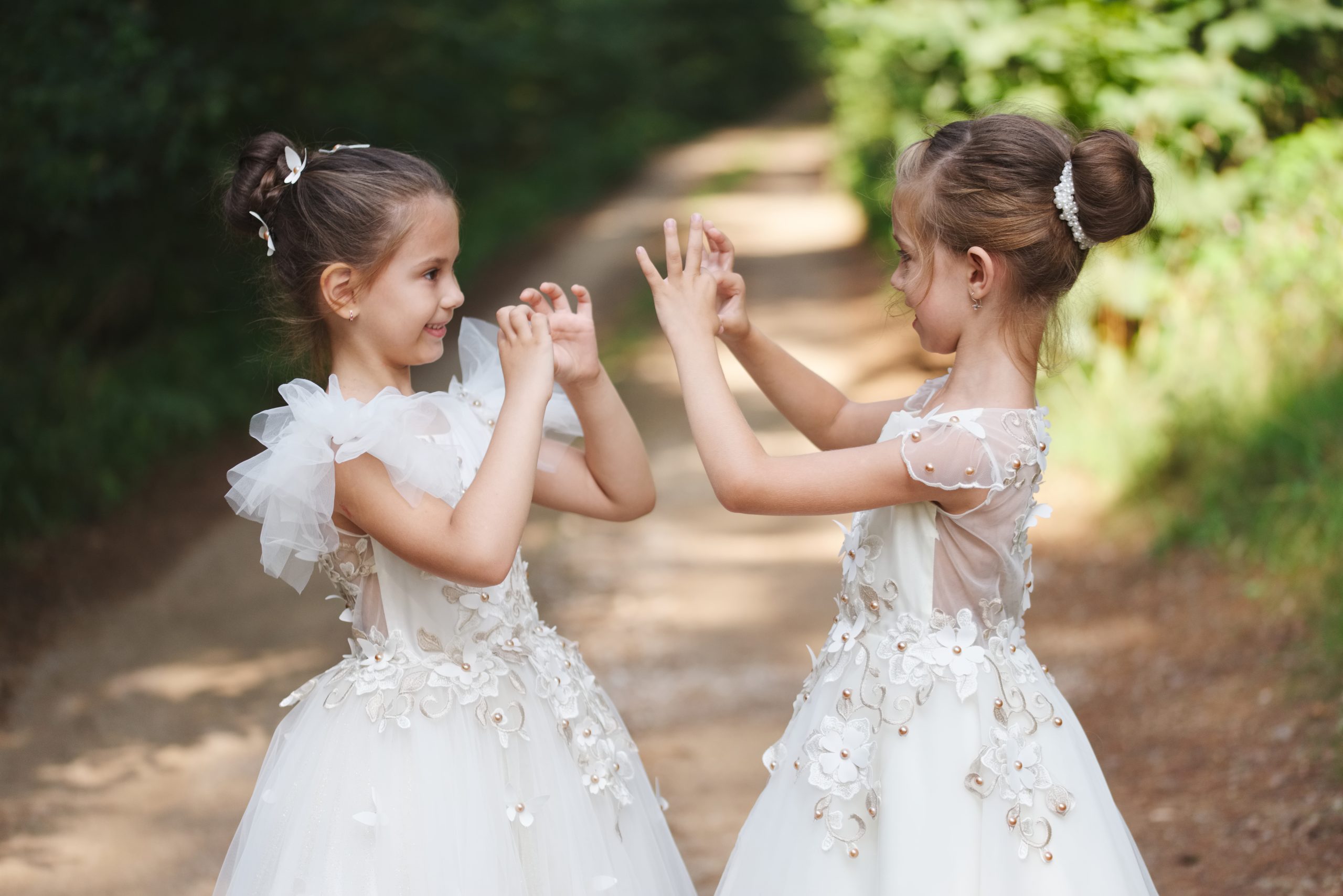 Happy,Beautiful,Girls,With,White,Wedding,Dresses